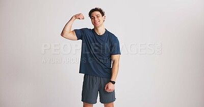 Buy stock photo Portrait, man and flex muscle for fitness, strength and mockup space in studio. Smile, person and bodybuilder show bicep for growth, strong or confident with exercise results on white background