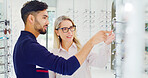 Health, man and shopping for glasses with optometrist, vision and assist with choice. Store, eyewear and person with optician for help, optometry or happy client with prescription lens for eye care