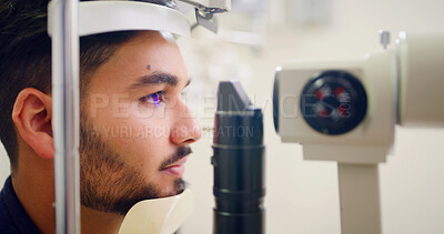 Buy stock photo Man, eye test and lamp machine for optometry inspection, laser correction and cornea procedure. Male person, equipment and light for ophthalmology assessment, retinal evaluation and testing vision