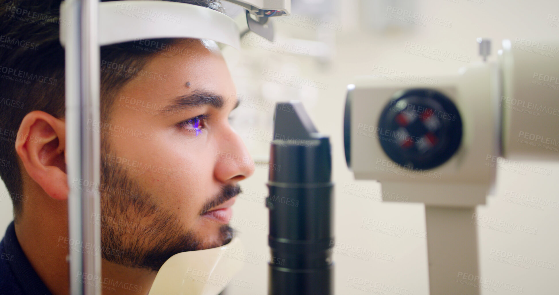 Buy stock photo Man, eye test and lamp machine for optometry inspection, laser correction and cornea procedure. Male person, equipment and light for ophthalmology assessment, retinal evaluation and testing vision