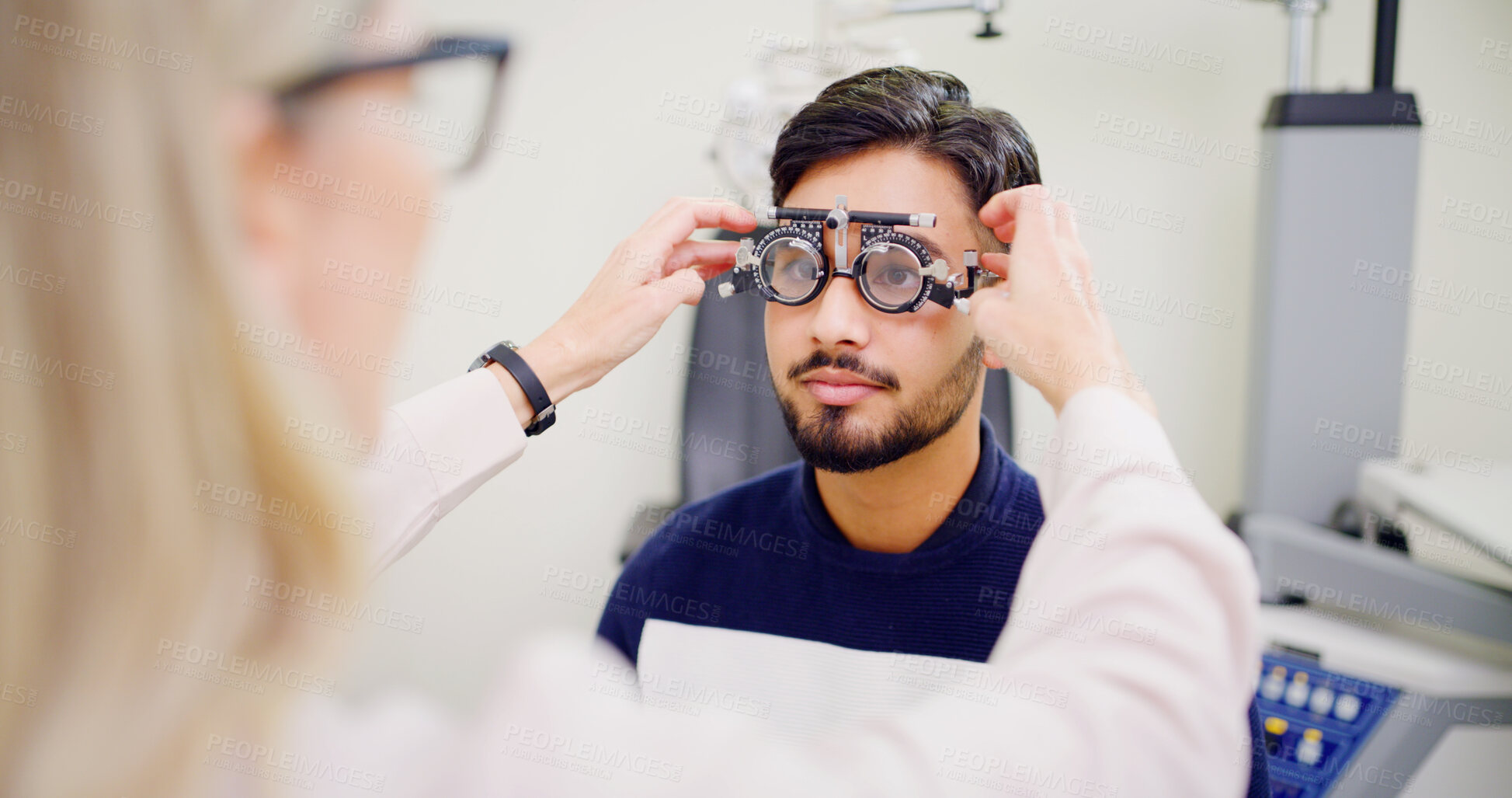 Buy stock photo Optometrist, man or trial lens frame for eye exam, vision assessment or consultation for clear sight. Client testing, optometry or people with tool to determine prescription, iris health or clinic