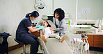 Dentist, mother and girl with teeth inspection for oral hygiene, healthcare and wellness in clinic. Dental hygienist, mom and child in consultation with mouth check for medical exam, help or support.