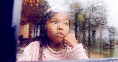 Buy stock photo Bored, rain and child at window with daydreaming, unhappy and thoughtful in winter season. Reflection, sadness and kid in house with cold climate, stuck mindset and lonely in stormy weather.