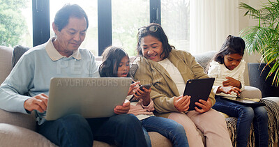 Buy stock photo Happy, grandparents and children with tech, home or watching funny movie on website, love and online. Laughing, old woman and grandchild with smartphone for digital game and senior man with laptop
