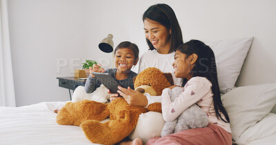 Buy stock photo Relax, mother and children on bed with tablet on weekend morning, bonding and streaming movie together. Social media, subscription site and girls with woman in home, tech and film platform for smile