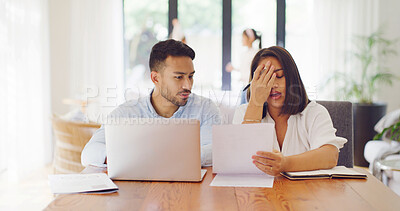 Buy stock photo Finance, frustrated or couple in house with paper, payment pressure or bankruptcy in money management. Stress, man or woman in home with digital taxes, missing bill or loss in poor financial planning
