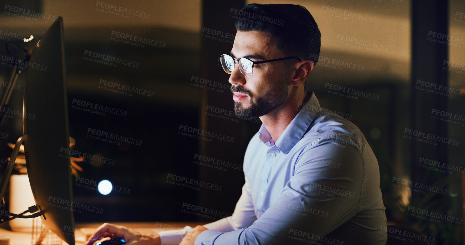 Buy stock photo Computer, man and research in office at night for article planning, story angle and fact checking. Journalist, person and tech at publishing agency for editing deadline, breaking news and submission