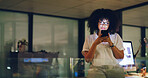 Woman, phone and night at startup, contact or glasses with deadline for social media marketing. Person, smartphone and review with app, scroll or check notification with overtime at digital agency