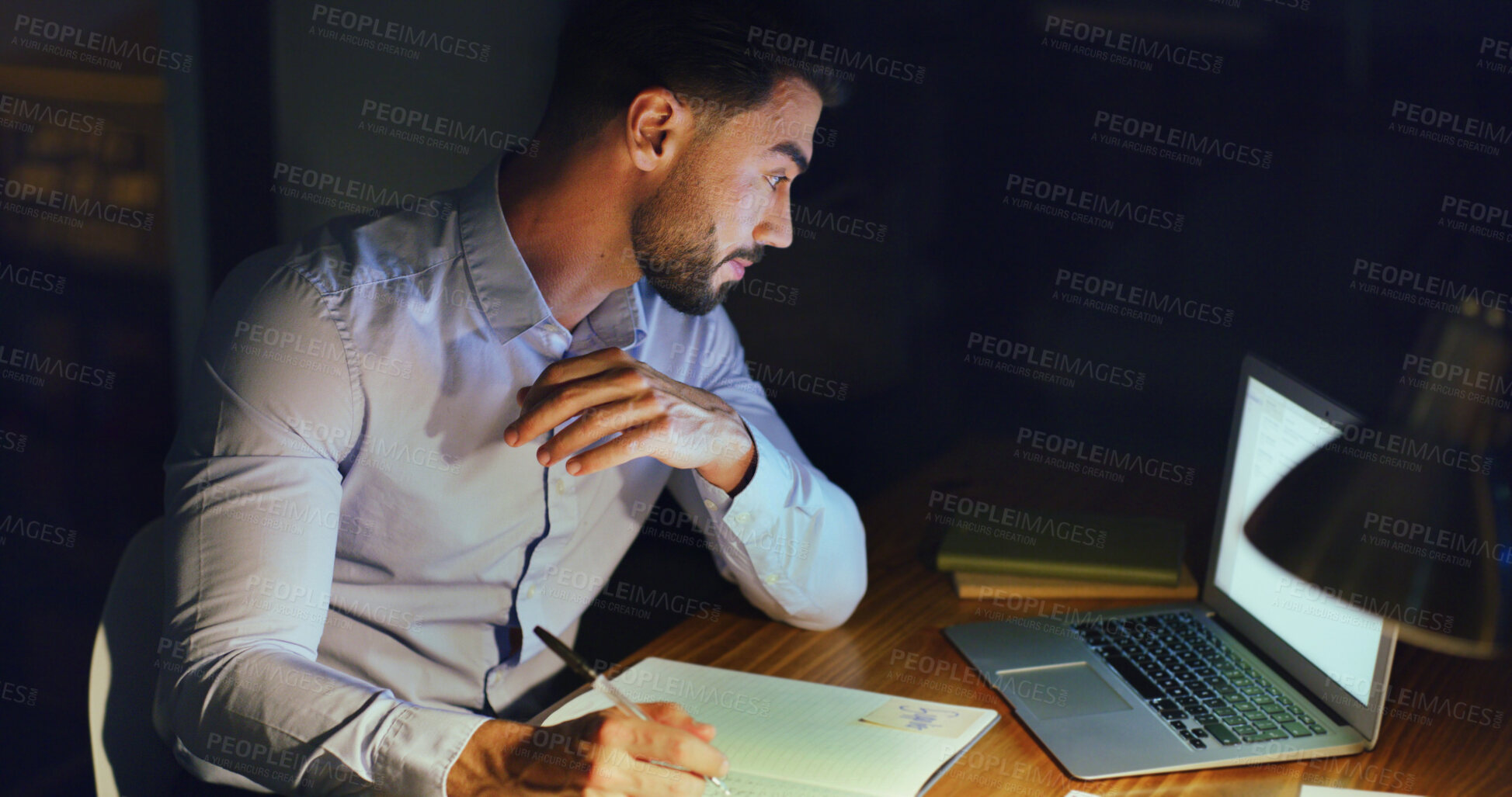 Buy stock photo Laptop, writing and businessman in office at night with research for finance report with budget. Planning, corporate career and male financial manager working on investment proposal with deadline.