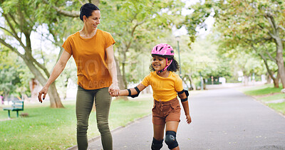 Buy stock photo Roller skating, holding hands and mother with kid in nature on holiday, getaway or weekend trip with balance. Happy, safety and mom with child in skates for hobby together outdoor in park on vacation