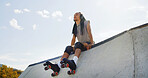 Man, headphones or urban park with roller skates for fitness, aerobic exercise or outdoor hobby. Male person, hipster or wheel boots with music for parkour sport on concrete legde in city or town