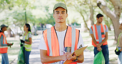 Buy stock photo Man, clipboard and portrait at park for volunteering, checklist or registration form for cleaning trash. Person, leader and group with bag, garbage recycling or stop climate change for sustainability