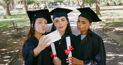 Buy stock photo Women, selfie and students at park for graduation, pout and certificate for education goals at campus. People, group and kiss emoji with photography, diploma or success with achievement at university