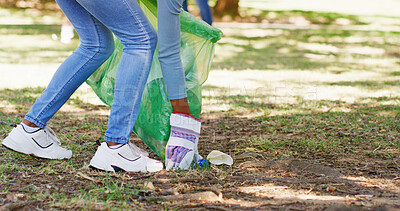 Buy stock photo Volunteer, hands or picking trash at park for community service, waste recycling or earth day. Sustainable NGO, person or litter collection outdoor for social responsibility, charity project or space