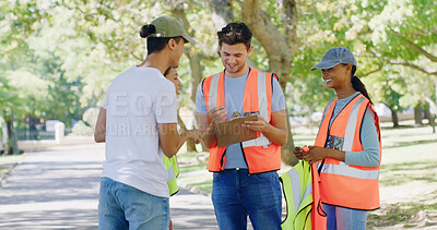 Buy stock photo Team, people and volunteer at park for sign up on clipboard, planning or accountability. Group, men and women for talk, happy or gloves for registration process with call to action for sustainability