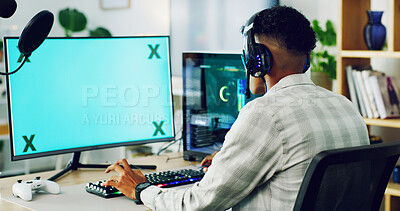 Buy stock photo Boy, computer screen and gaming with headset for esport, competition or streaming gameplay in home. Back view, teenager or gamer with monitor display for competitive online match on mockup space