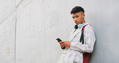 Buy stock photo Phone, portrait and typing with teen boy in city for commute to high school destination. App, space and text message with student outdoor in urban town for break, education or mobile communication