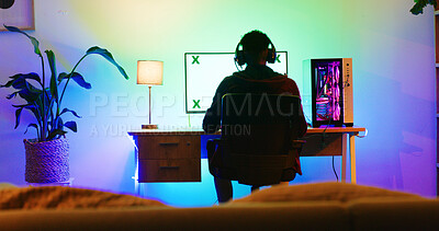 Buy stock photo Man, gaming pc and headphones in home, night and blank screen with mockup space for user experience. Person, computer and monitor with audio, streaming and online video gamer with challenge at house