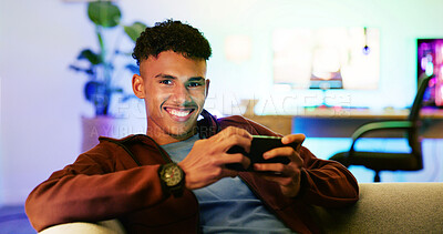 Buy stock photo Portrait, smartphone gaming and teenage boy on sofa, relaxing and competition in living room. Home, happiness and gamer on couch, cellphone and digital app for online score, internet and esports