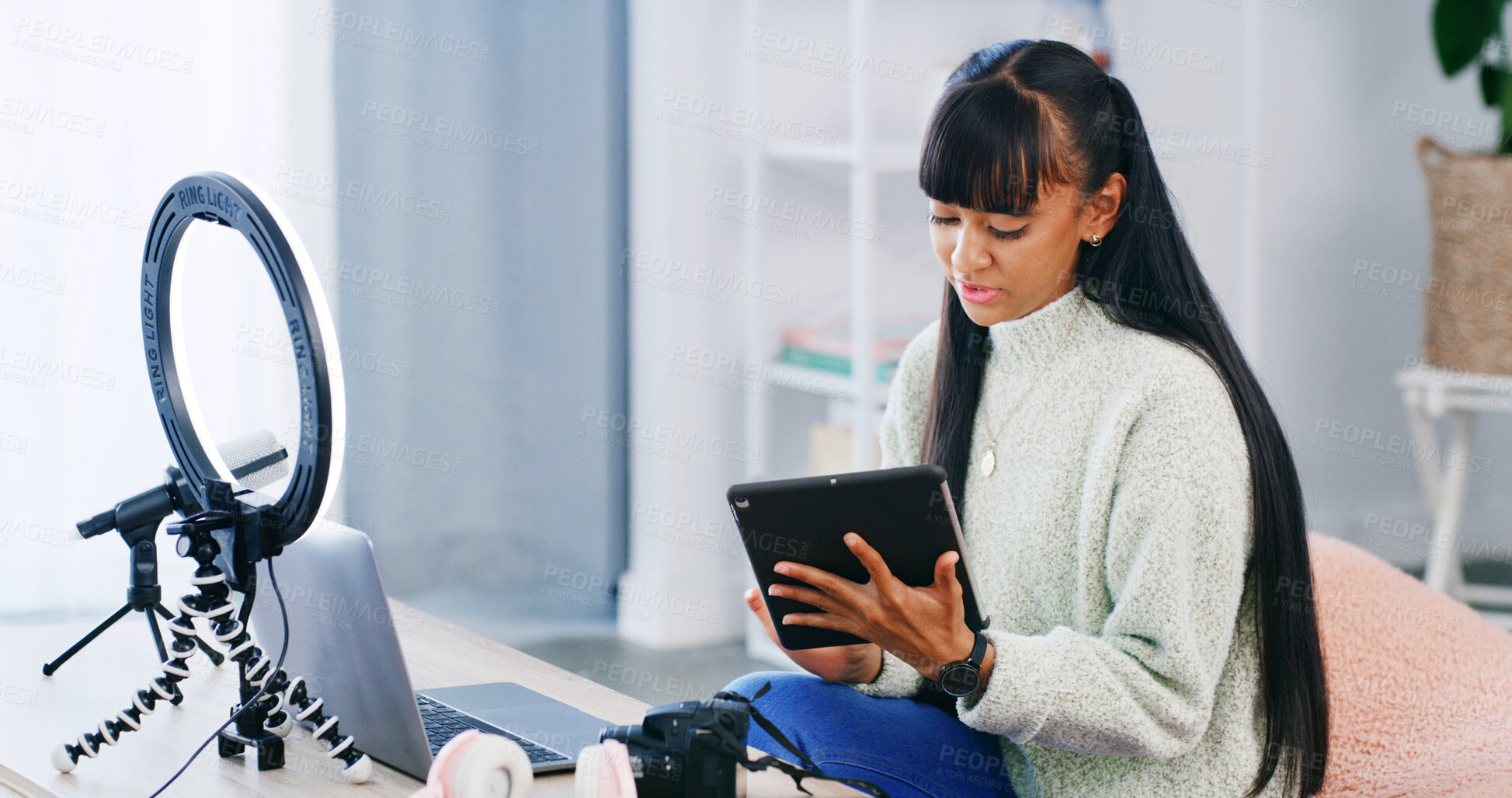 Buy stock photo Girl, tablet and influencer with scroll, home or post schedule with checklist for content creation. Person, laptop and teenager with recording tech, app or notes for web show on social media in house