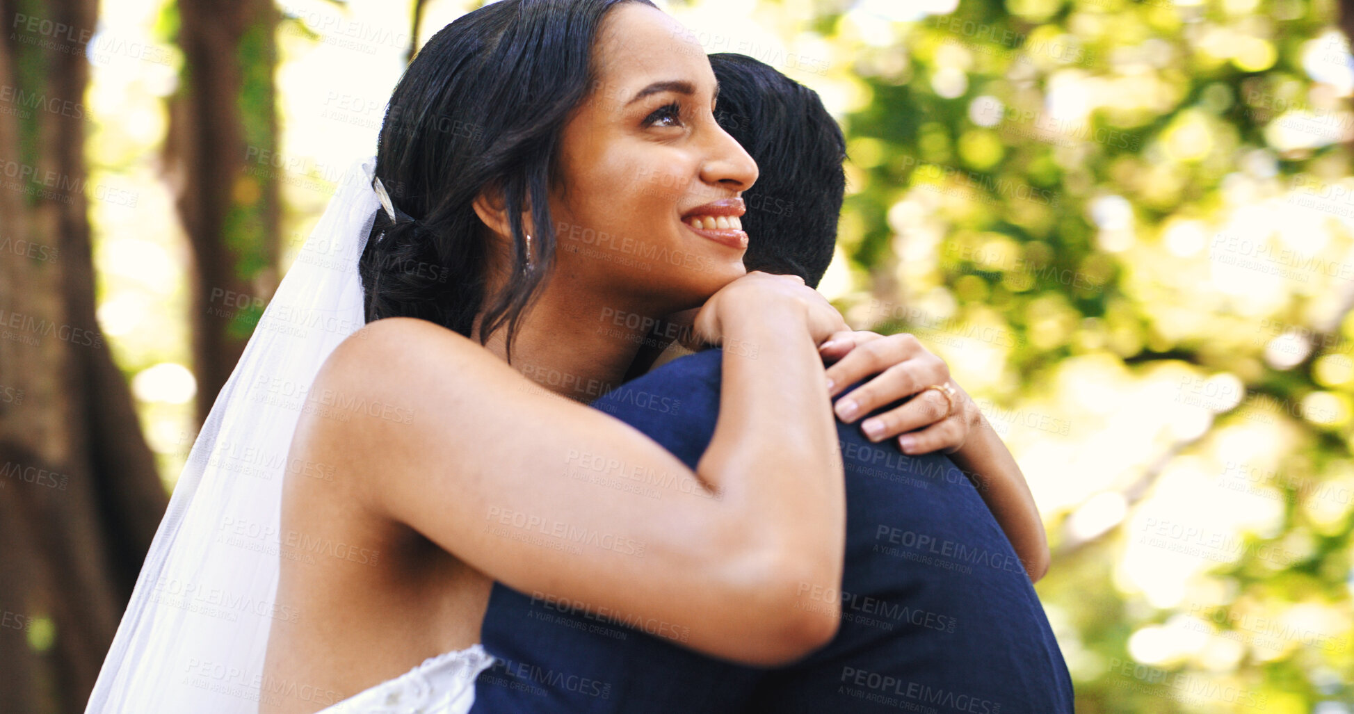 Buy stock photo Wedding, couple and smile with hug at park for marriage ceremony, celebration and love commitment. Happy people, bride and groom with embrace at outdoor event for relationship union, bonding or bokeh