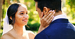 Wedding, couple and smile with romance at park for marriage celebration, love commitment or trust. Happy people, bride and groom with connection at ceremony for relationship union, bonding or bokeh