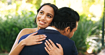 Buy stock photo Woman, hug groom and outdoor at wedding, smile and thinking for memory, milestone and relationship. People, embrace and excited with bride, commitment or marriage celebration at park in summer