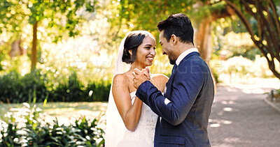 Buy stock photo Couple, wedding and dance at park, smile and holding hands with connection, event and milestone. People, marriage and celebration with commitment, relationship or excited outdoor with rhythm for love