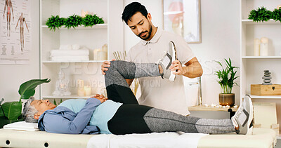 Buy stock photo Physiotherapy, knee pain and physiotherapist with mature woman in clinic for muscle recovery. Healthcare, checkup and physical therapist with female patient with leg exercise for rehabilitation.