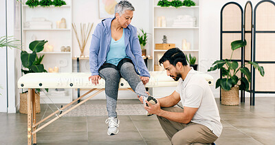 Buy stock photo Physiotherapy, foot exam or woman in clinic for consultation, help or service in rehabilitation. Healthcare, mature client or chiropractor in center with checkup, injury or visit for muscle recovery.