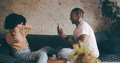 Buy stock photo Happy, couple and photography of partner on sofa for weekend memory, support and relationship fun. Love, african people and smile with picture in home for status update, social media post and bonding