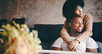 Thinking, couple and hug in lounge, care and bonding on break with smile, love and romance in house. Happy, man and embrace with woman in living room, affection and reflection for future or marriage
