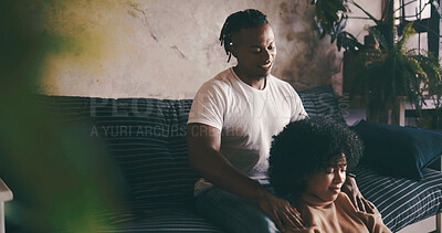 Buy stock photo Home, shoulder massage and couple with love, relax and bonding together with support. Happiness, black man or woman in lounge, smile or relationship with wellness, care and comfort with stress relief