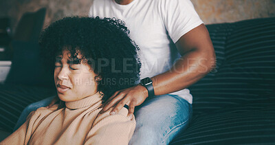Buy stock photo Woman, relax and shoulder with massage on sofa for bonding, pamper or valentines day in home. Female person, couple or man helping with pain for muscle tension, discomfort or stress relief in house