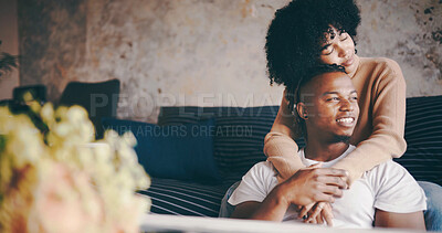 Buy stock photo Thinking, couple and hug in lounge, love and bonding on break with smile, trust and romance in home. Happy, man and embrace with woman in living room, reflection and affection for partner in house