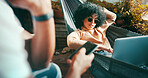 Outdoor, sunglasses and woman on hammock with laptop, couple relax together and streaming film on weekend. Bonding, phone screen and people in backyard of home for social media, tech and watch movie