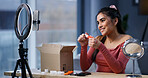 Girl, influencer and unboxing lipstick with ring light, happy and review product with color test on web show. Person, content creator and beauty for makeup, cosmetics or mobile app for social media