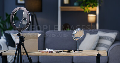 Buy stock photo Live stream, ring light and makeup in empty room of home for influencer, social media and interior. Phone broadcast, vlogging equipment and recording with beauty products  in house for cosmetics blog