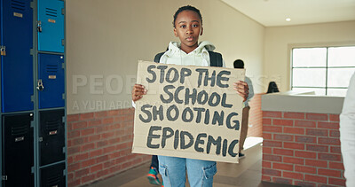 Buy stock photo Portrait, school and girl with sign, activist and education with placard, voice and gun violence awareness. Show, student or child in hallway, basic rights and banner to promote equality or knowledge