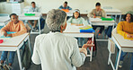 Teacher, presentation and education with children in classroom for students, quiz discussion and attention. Course guidance, speaker and problem solving solution with kids in school for lesson
