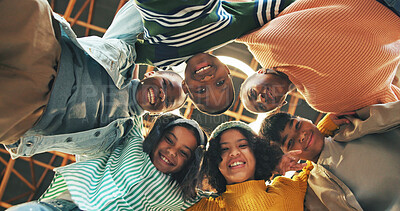 Buy stock photo Portrait, school kids and huddle with teamwork for education, academic growth and skill development. Below, happy children or hug with pride for collaboration, knowledge or group solidarity in class.