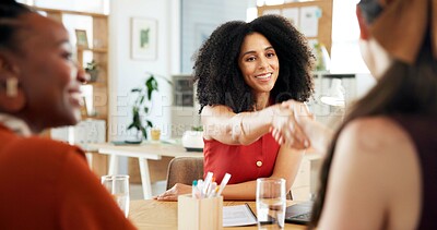 Buy stock photo Office, handshake and business women with smile for promotion, workshop or celebration for feedback. Team, designers and shaking hands with partnership for achievement, meeting or negotiation success