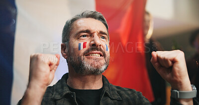 Buy stock photo Victory, watching and man in home with fist pump, goal or celebration in soccer tournament. Support, sport and football fans in house with success, joint excitement and score lead for France.