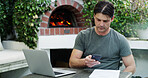 Backyard, man and typing with phone for finance planning, review online bills or budget for household. Expenses, tax rebate form and person with tech for track cash flow, saving goals or debt payment