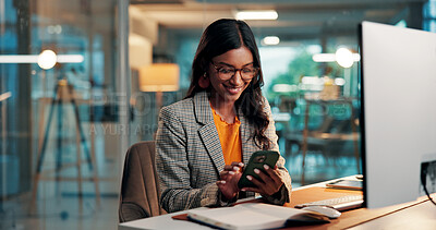 Buy stock photo Phone, message and woman with computer in office for creative project overtime with online article. Glasses, draft feedback and magazine editor with evening for review or publishing deadline on tech
