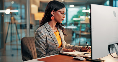 Buy stock photo Notebook, writing and woman with computer in office for creative project and online article. Evening, feedback and magazine editor with agenda, to do list or review for publishing deadline on tech