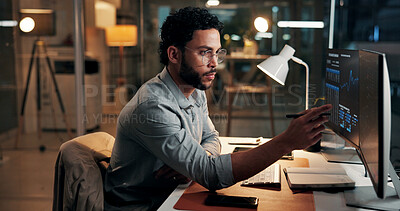 Buy stock photo Computer, trading and business man reading with stock market info, finance data and night. Trader, pointing and serious person with desktop for investment chart, risk management or overtime in office