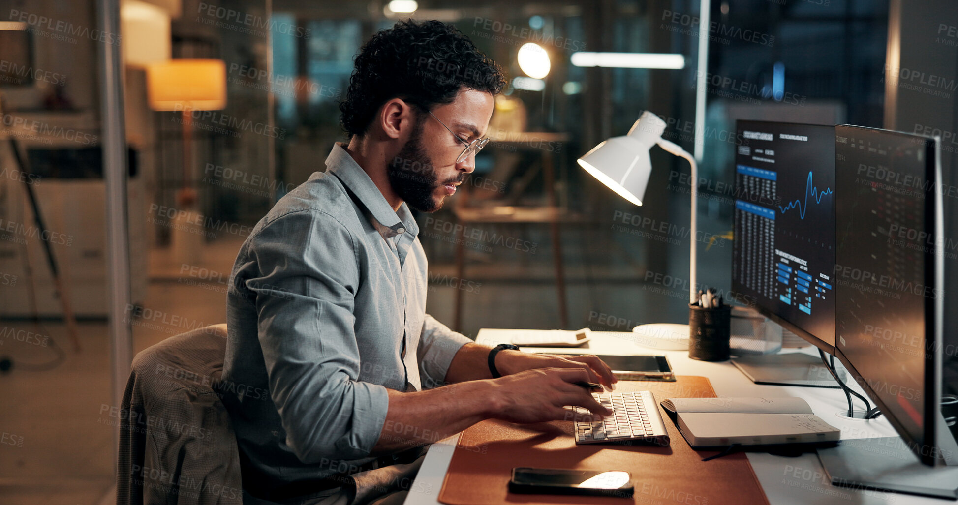 Buy stock photo Computer, trading and business man typing for stock market, finance data and night. Trader, graphs and serious person with desktop for investment analysis, risk management and overtime in office