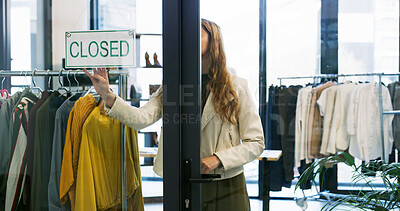 Buy stock photo Small business, closed and woman with fashion, sign or outfit in designer boutique or thrift store. Entrepreneur, done and retail owner for service, product or startup with quality fabric at mall