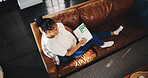 Above, black woman and writing with notebook in living room for planning, schedule or checklist. Creative, thinking and journal of freelancer for remote work, copywriting or ideas for article editor